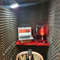 a home voiceover studio in a closet in a bedroom with the window open